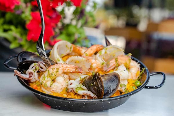 Quels conseils pour une paella aux fruits de mer avec une cuisson parfaite du riz ?